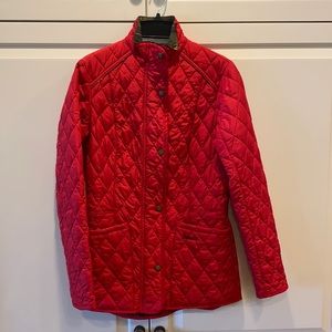 Red quilted Barbour jacket.